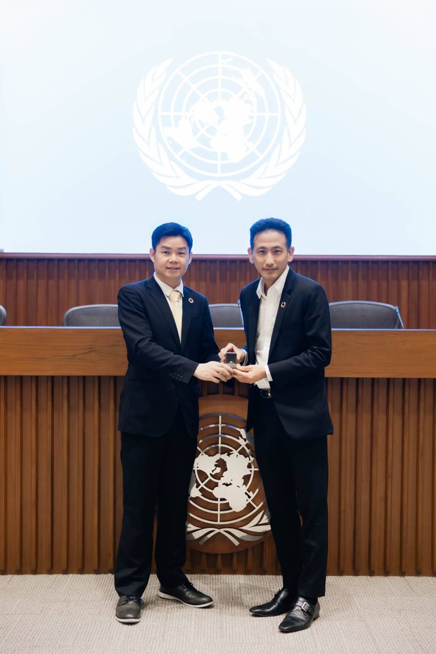 Mr. Dhazzaphak Lertsavetpong (right) at the United Nations Conference Centre, Bangkok